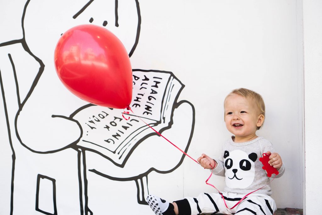 What are environmental sounds and how can they help toddlers learn to talk?